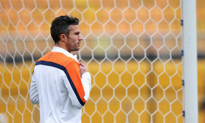  Robin van Persie looks on during the Netherlands training session at the 2014 FIFA World Cup Brazil held at the Estadio Paulo Machado de Carvalho Pacaembu on July 8, 2014 in Sao Paulo, Brazil. (Dean Mouhtaropoulos/Getty Images)