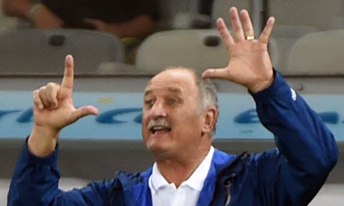 Brazil's coach Luiz Felipe Scolari gestures during the semi-final football match between Brazil and Germany at The Mineirao Stadium in Belo Horizonte on July 8, 2014, during the 2014 FIFA World Cup . (PEDRO UGARTE/AFP/Getty Images)