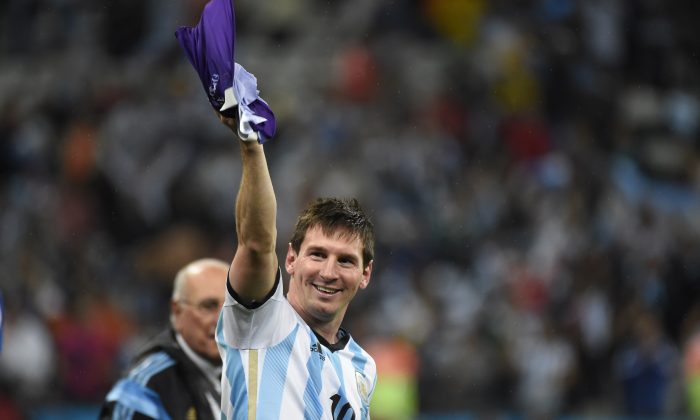 Argentina's forward and captain Lionel Messi celebrates after winning their FIFA World Cup semi-final match against the Netherlands in a penalty shoot-out following extra time at The Corinthians Arena in Sao Paulo on July 9, 2014. (ODD ANDERSEN/AFP/Getty Images)
