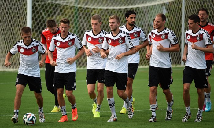 Germany´s players warm up during a training session in Santo Andre on July 10, 2014, ahead of the final match Argentina vs Germany on July 13, during the 2014 FIFA World Cup football tournament. (PATRIK STOLLARZ/AFP/Getty Images)