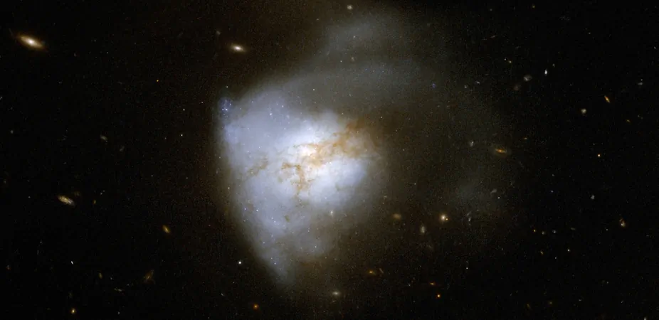 Arp220 is a nearby Ultraluminous Infrared Galaxy similar to what ALESS65 would look like if it were closer to Earth. (NASA, ESA, the Hubble Heritage (STScI/AURA)-ESA/Hubble Collaboration, and A. Evans/University of Virginia, Charlottesville/NRAO/Stony Brook University)