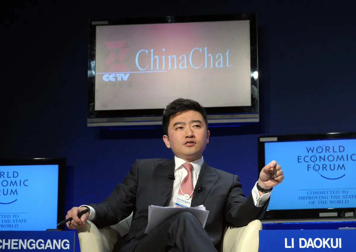 Rui Chenggang, anchor of China Central Televison (CCTV), talks during a CCTV televised debate focusing on China's growth at the World Economic Forum on January 29, 2010 in Davos. Rui was taken away by governmental anti-corruption organization for investigation on July 11, 2014. (Eric Piermont/AFP/Getty Images)