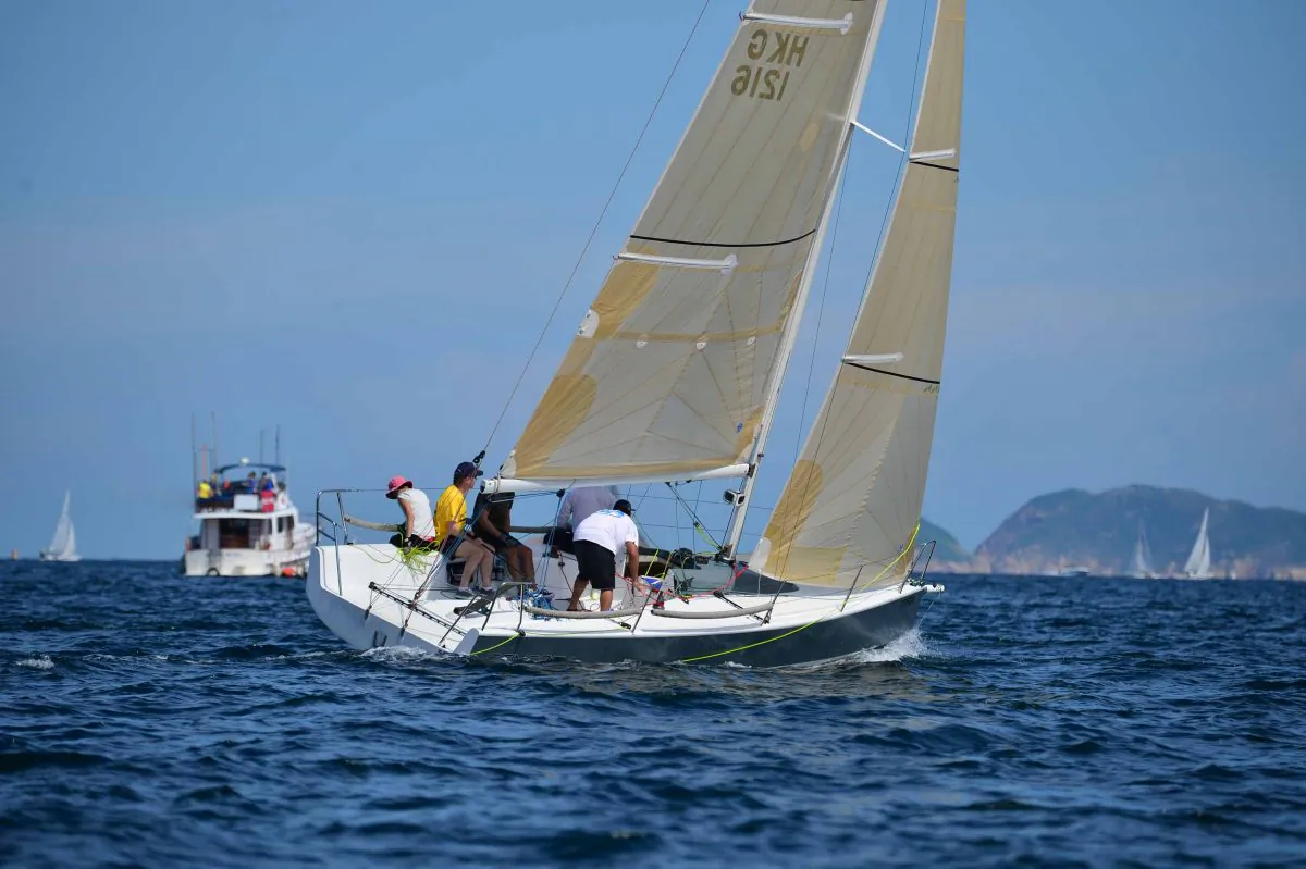 Jim Daly and crew of ‘Stingray’ on their way to taking Line Honours and first place in Race-3 of the Hebe Haven Helly Hansen Summer Saturday Series 2014 on Saturday June 28, 2014. (Bill Cox/Epoch Times)