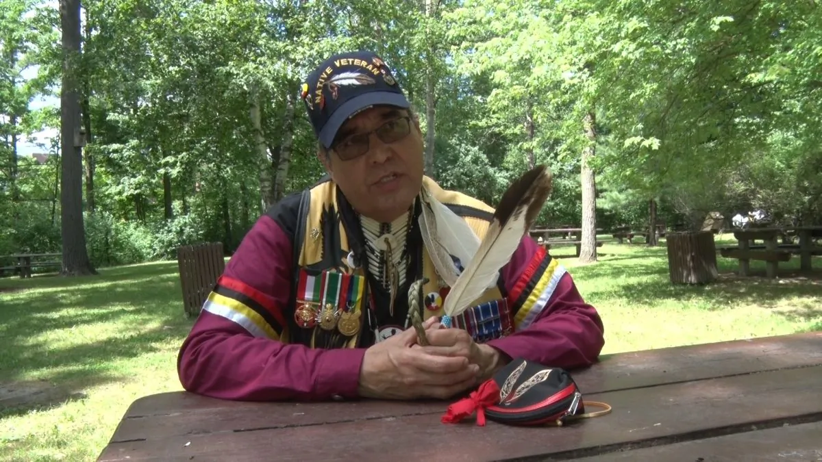 Earl Robert Crane speaks on the relationship between Canada and its original peoples during the Aboriginal Festival and Competition Powwow in Ottawa in June 2014. Crane believes Aboriginal Peoples are nearing a time when they can assert their legal rights in a more significant way. (Matthew Little/Epoch Times)