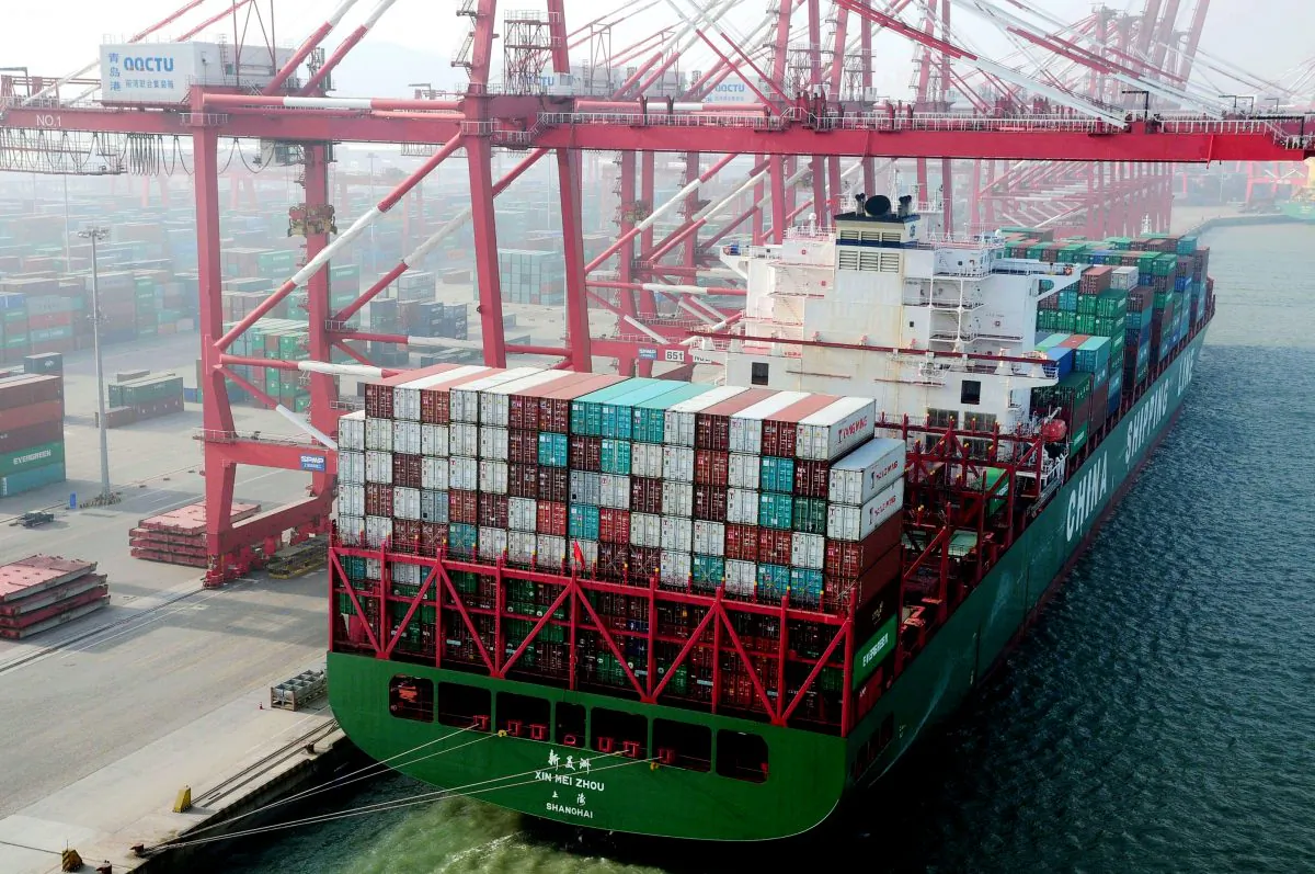 A container ship berths at the port of Qingdao, in northeast China’s Liaoning Province on Jan. 20. Chinese handheld scanning devices used in shipping and logistics were found to contain spying software. (STR/AFP/Getty Images)