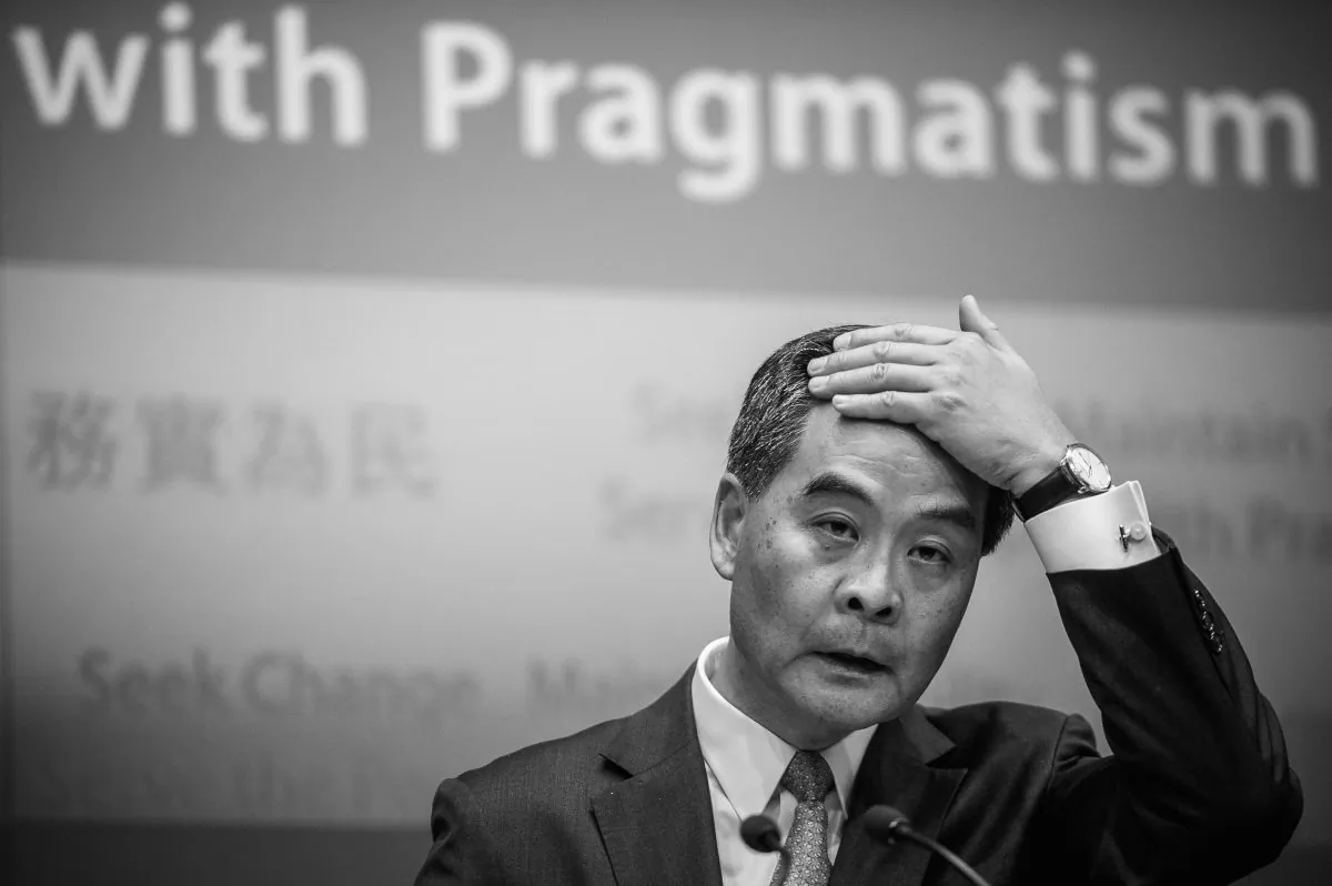 Hong Kong Chief Executive Leung Chun-ying addresses a press conference after his maiden policy address in Hong Kong on Jan. 16, 2013. Hong Kong's China-backed leader plans to tackle the city's housing crisis in a policy speech aimed at soothing anger following a series of mass protests urging him to quit. (AFP photo/Philippe Lopez)
