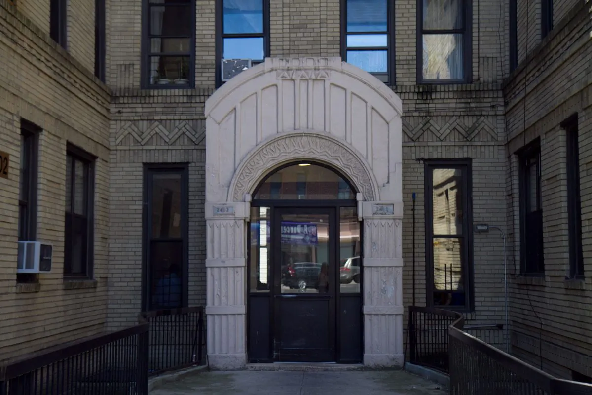 The apartment building where the family of 2-year-old Ruhshona Kurbonova lives, in Brooklyn on Saturday, July 5, 2014. The toddler drowned in a lake in Prospect Park after wandering away from a family gathering on Saturday. (Annie Wu/Epoch Times)