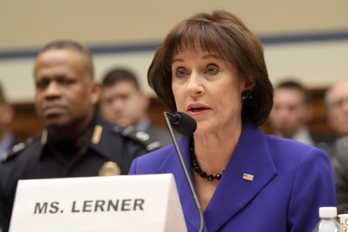 In this photo former Internal Revenue Service (IRS) official Lois Lerner speaks on Capitol Hill in Washington, on March 5, 2014. (AP Photo/Lauren Victoria Burke)