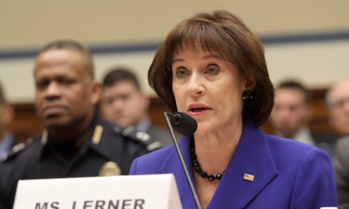 In this photo former Internal Revenue Service (IRS) official Lois Lerner speaks on Capitol Hill in Washington, on March 5, 2014. (AP Photo/Lauren Victoria Burke)