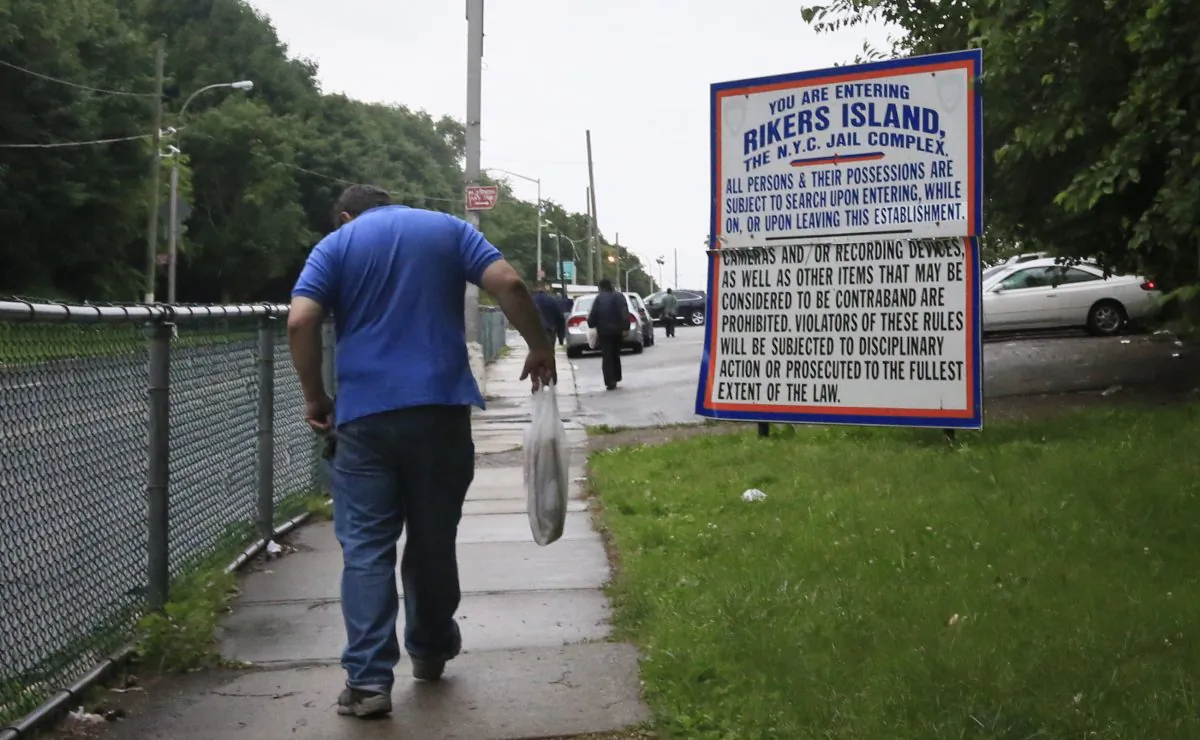 A sign informing visitors what can be brought to Rikers Island jail in the Queens borough of New York, June 11, 2014. City lawmakers will call a special meeting to hear from correction officials how they plan to quell rising levels of violence in city jails, and their plan to effectively treat a growing mentally ill inmate population. (AP Photo/Bebeto Matthews)