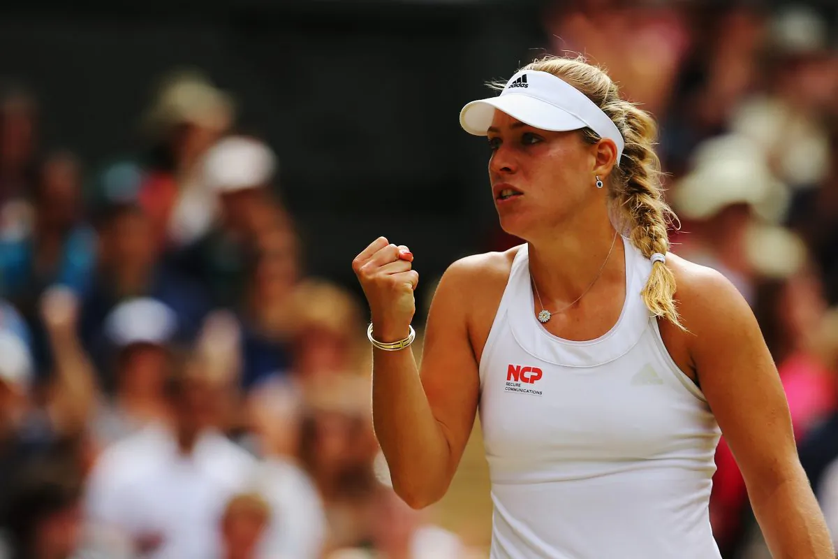 Angelique Kerber of Germany celebrates during her Ladies' Singles fourth round match against Maria Sharapova of Russia on day eight of the Wimbledon Lawn Tennis Championships at the All England Lawn Tennis and Croquet Club on July 1, 2014 in London, England. (Al Bello/Getty Images)