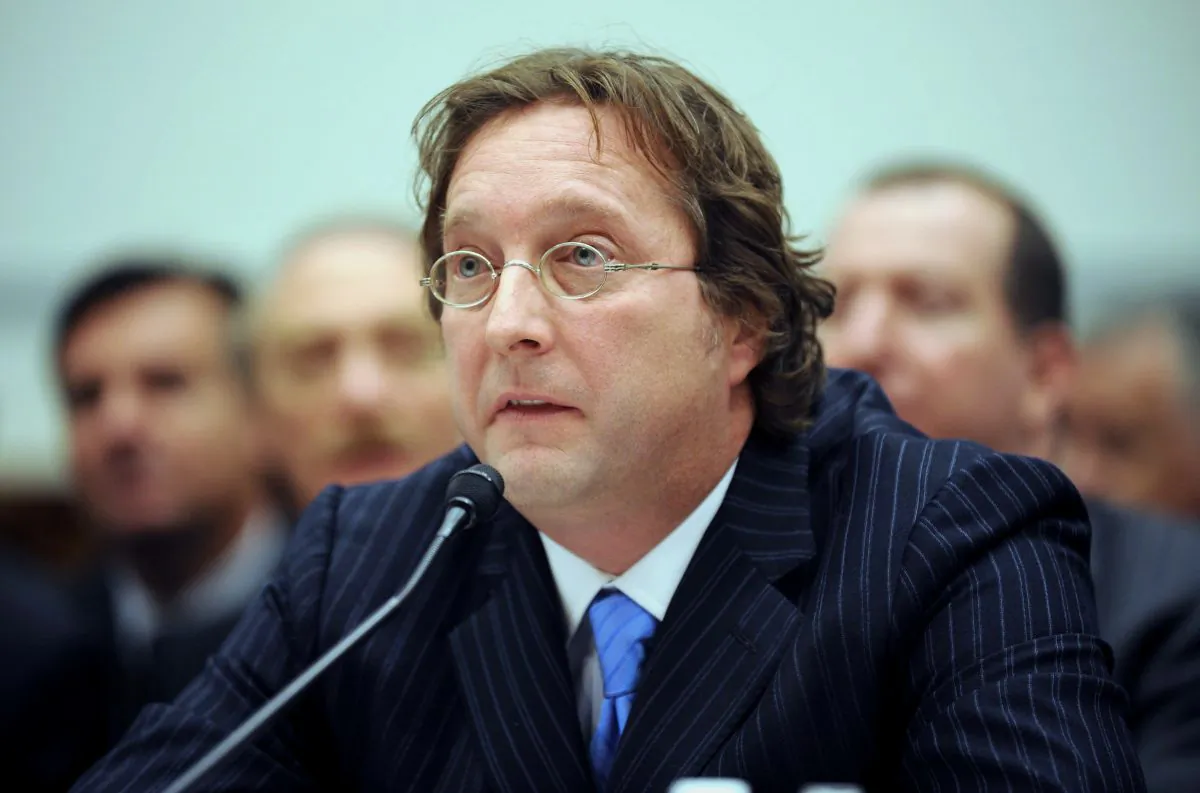Senior Managing Partner of Harbinger Capital Partners Philip Falcone testifies on Capitol Hill on Nov. 13, 2008. (Kevin Wolf/AP)