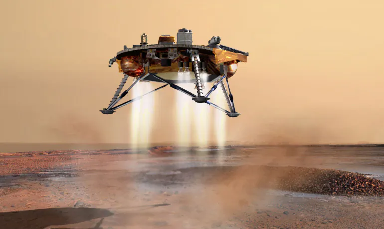 Wet beads seen on the legs of the Phoenix spacecraft offered the first evidence of salts on Mars. Scientists now believe the beads were muddy saltwater that splashed on the lander's leg as it touched down in the northern polar region. (NASA/JPL-Calech/University of Arizona)