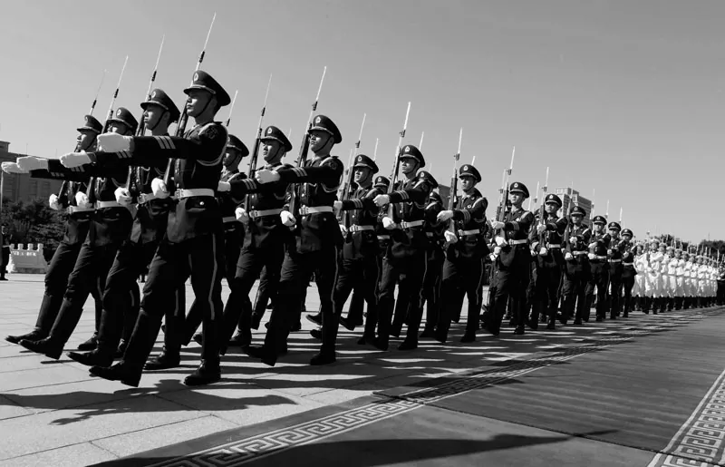 Chinese military troops march before U.S. Secretary of Defense, Leon Panetta, at the Bayi Building in Beijing, China, 2012. (Larry Downing/Getty Images)