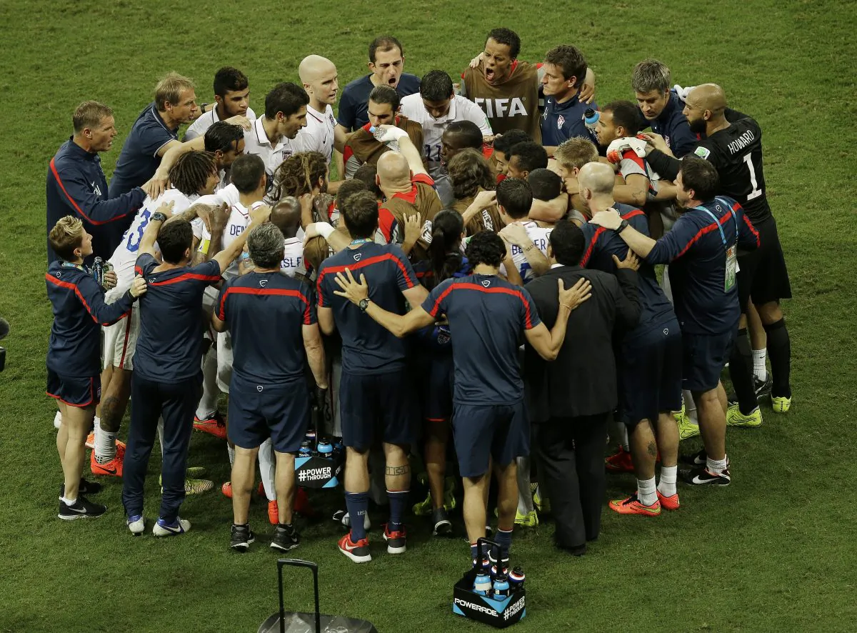 The U.S. team huddles before the beginning of the extra time during the World Cup round of 16 soccer match between Belgium and the USA in Salvador, Brazil, on July 1, 2014. (AP Photo/Themba Hadebe)