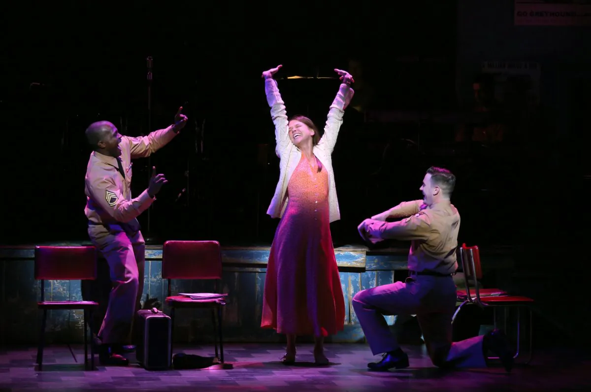 (L–R) A moment of jubilance for fellow travelers Flick (Joshua Henry), Violet (Sutton Foster), and Monty (Colin Donnell) in “Violet.” (Joan Marcus)
