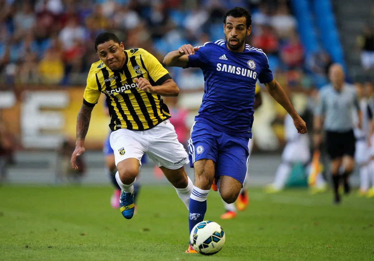 Mohamed Salah of Chelsea and Wallace Oliveira dos Santos of Vitesse battle for the ball during the pre season friendly match between Vitesse Arnhem and Chelsea at the Gelredome Stadium on July 30, 2014 in Arnhem, Netherlands. (Photo by Dean Mouhtaropoulos/Getty Images)