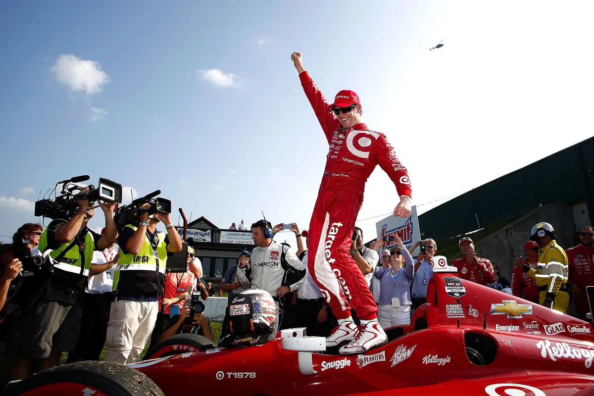 Scott Dixon of New Zealand, driver of the #9 Target Chip Ganassi Racing Dallara Chevrolet, celebrates after winning the Verizon IndyCar Series Honda Indy 200 at Mid-Ohio Sports Car Course on August 3, 2014 in Lexington, Ohio. (Kirk Irwin/Getty Images)