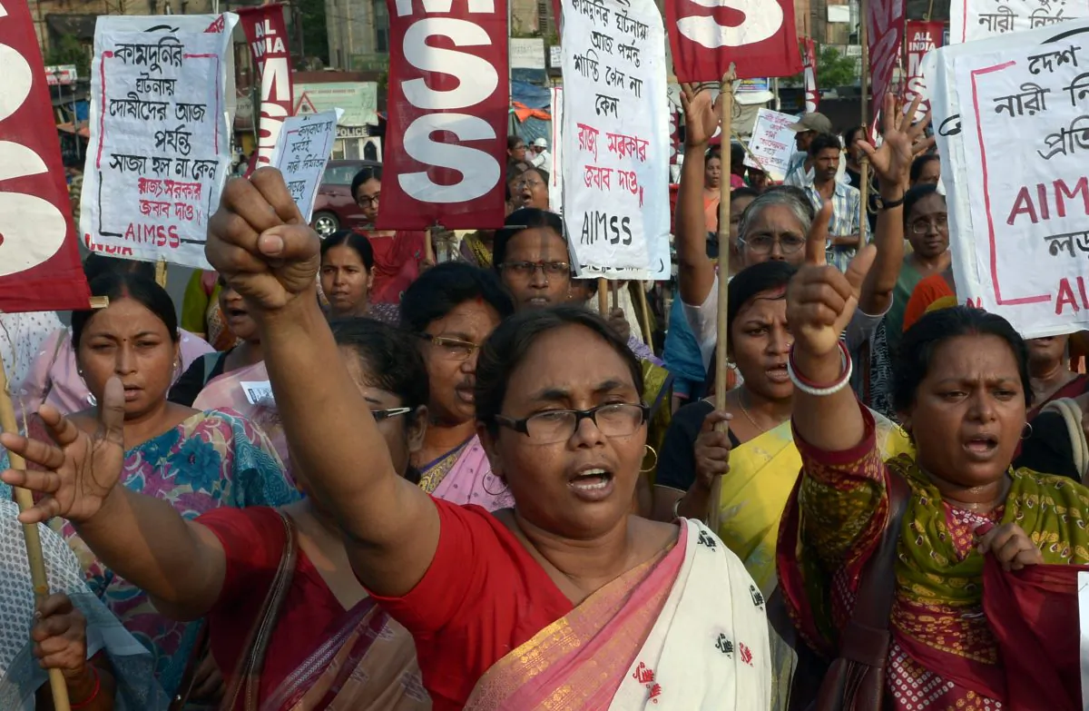 Indian activists from the Social Unity Center of India (SUCI) shout slogans against the state government in protest against the gang-rape and murder of two girls in the district of Badaun in the northern state of Uttar Pradesh and recent rapes in the eastern state of West Bengal, in Kolkata on June 7, 2014. (Dibyangshu Sarkar/AFP/Getty Images)