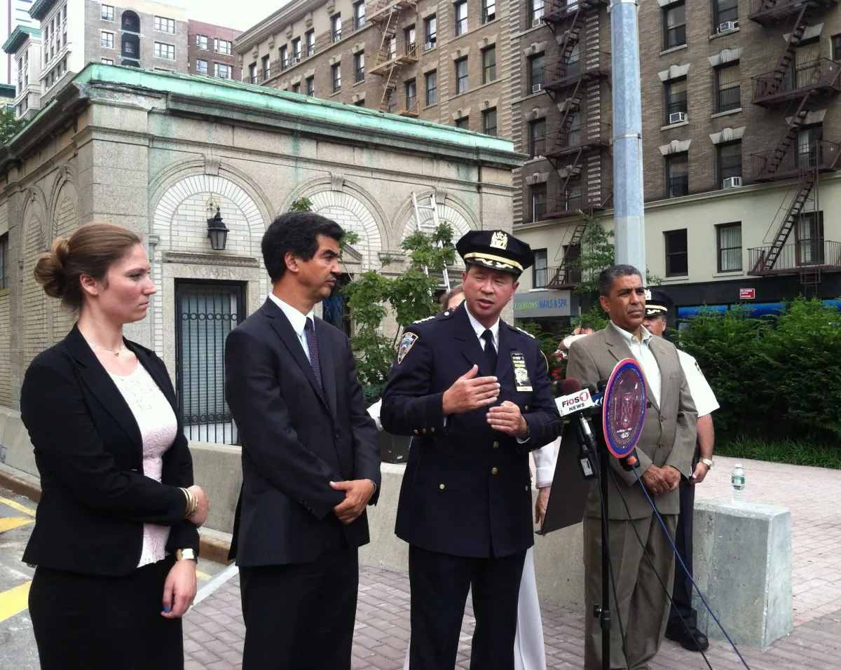 NYPD transportation chief Thomas Chan (C) at a press conference on the Upper West Side, Manhattan, N.Y., on Aug. 4, 2014. A new reduced 25 mph speed limit is in effect along Broadway from 59th St. to 220th St. (Annie Wu/Epoch Times)