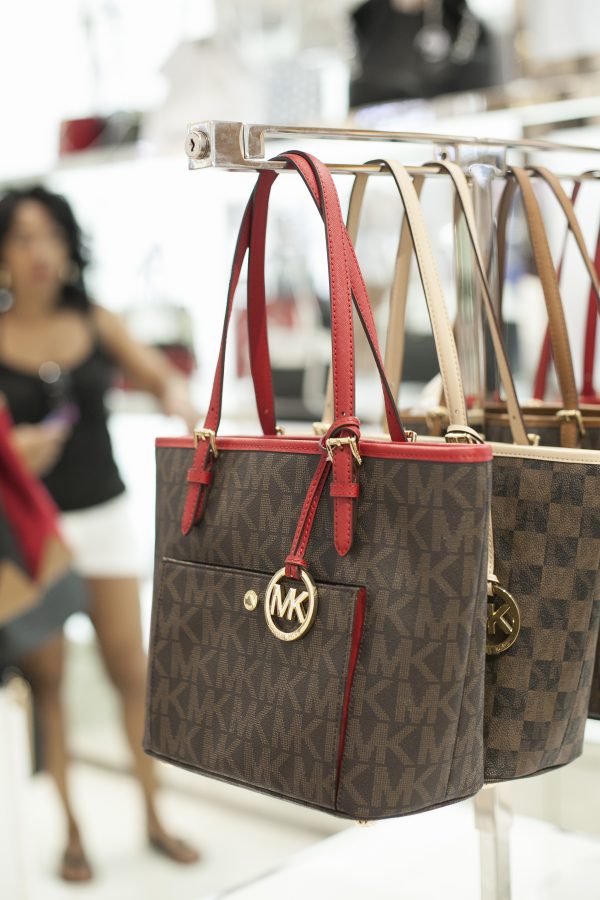 A Michael Kors handbag is on display at Macy's 34th Street store which looks very similar to louis vuitton designs, in Manhattan, on Aug. 4, 2014. (Samira Bouaou/Epoch Times)