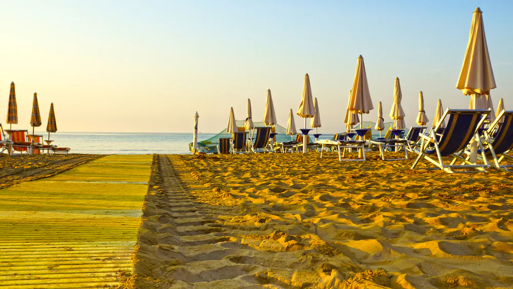 umbrellas on the beaches of Italy in the morning hour. (*Shutterstock)