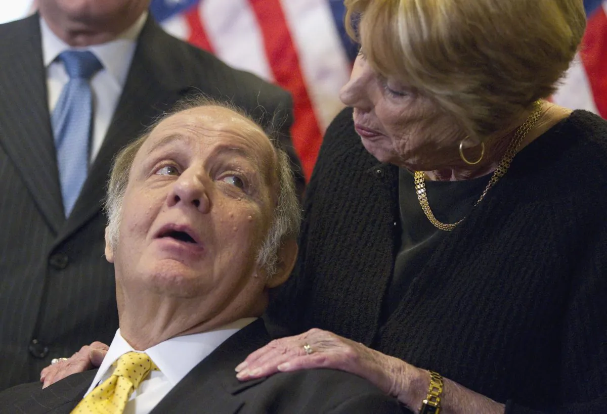 Former White House press secretary James Brady (L), and his wife Sarah Brady, on Capitol Hill in Washington, March 30, 2011. (Evan Vucci/AP)