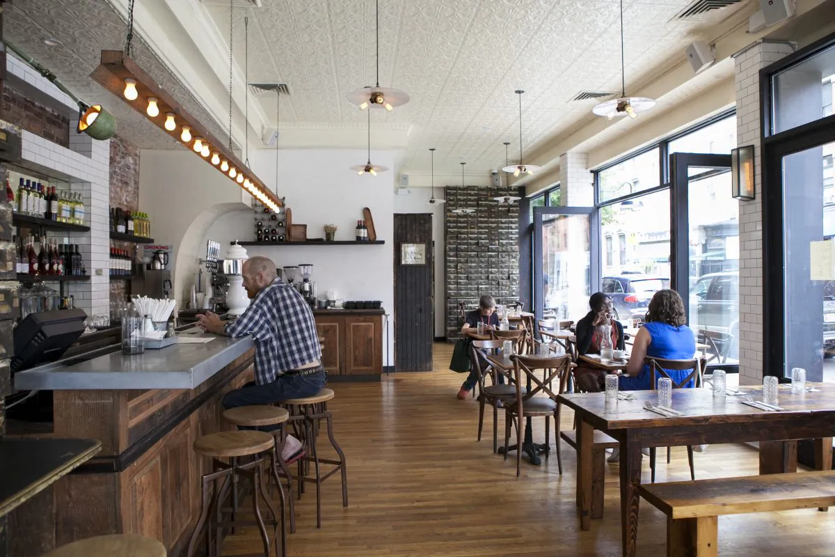 The dining room at San Marzano is spacious and drenched in light. (Samira Bouaou/Epoch Times)