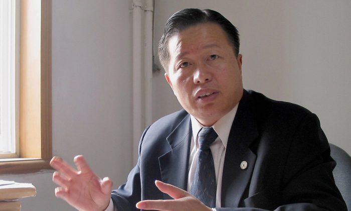 Gao Zhisheng gives an interview at his office in Beijing, 02 November 2005. The prominent Chinese human-rights lawyer has been released from prison after five and a half years. (Verna Yu/AFP/Getty Images)