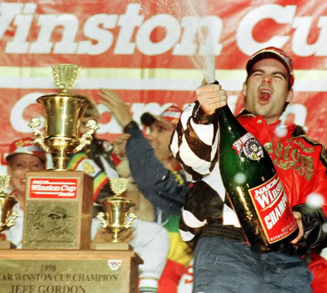 Jeff Gordon celebrates in 1998 championship.