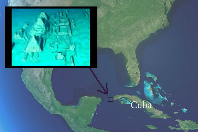 Map of North America seen from space with Cuba indicated. (Shutterstock*) The arrow is pointing to the west coast of Cuba, where underwater stone structures were discovered in 2001 by Pauline Zalitzki and Paul Weinzweig. (Screenshot/The Cosmos News/Youtube) 