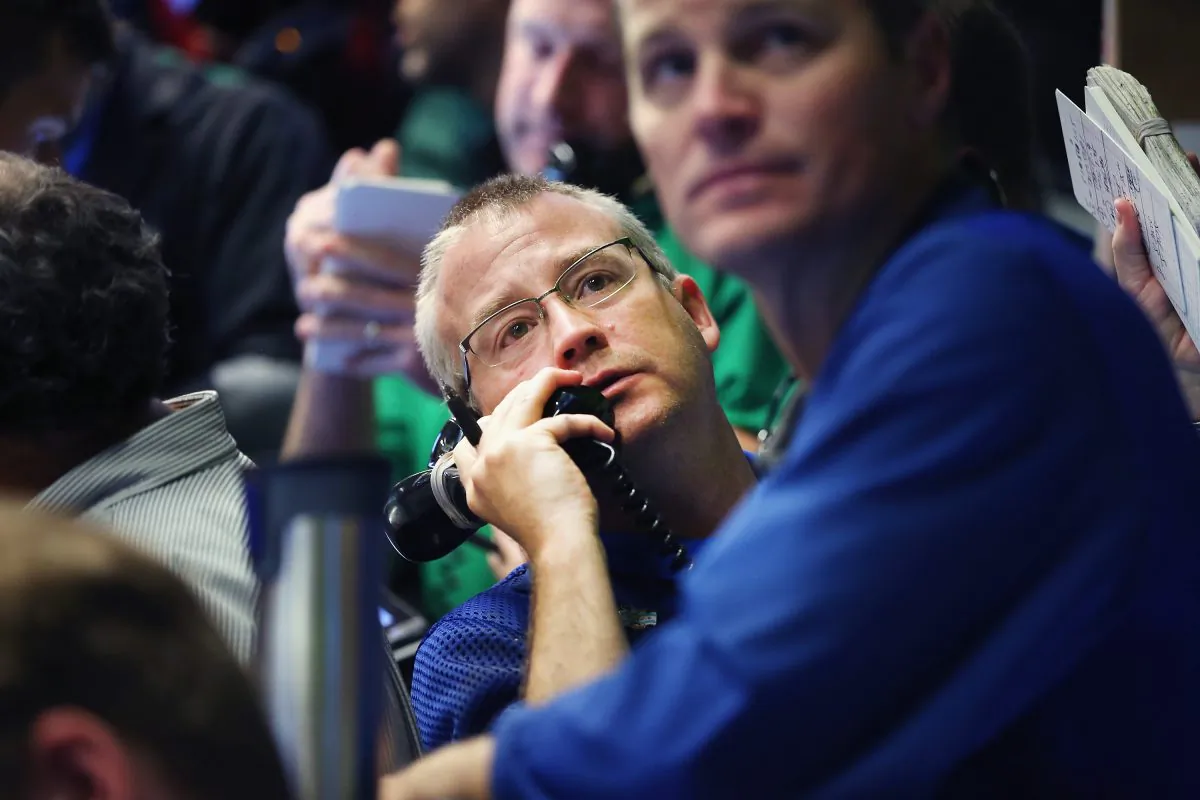 A trader takes an order in the options pit at the Chicago Board Options Exchange (CBOE) on July 30. (Scott Olson/Getty Images)