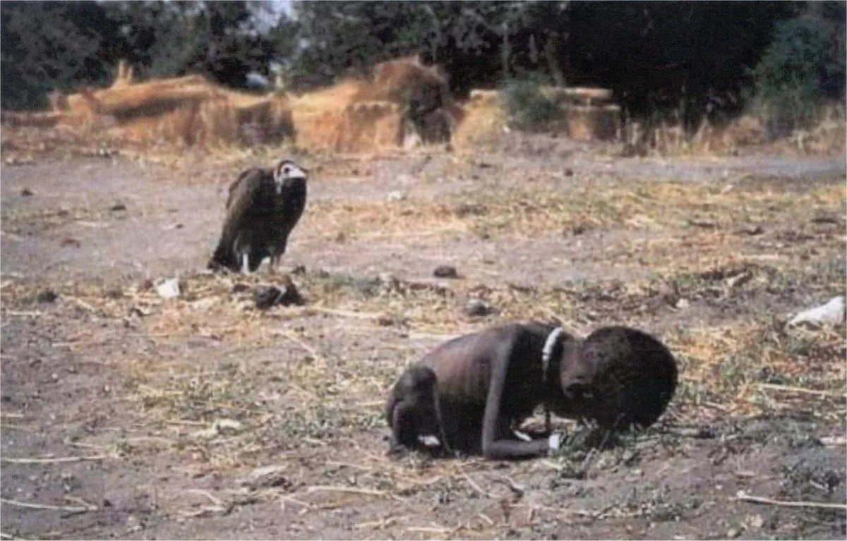 A vulture waits for this child to die of hunger in Africa.