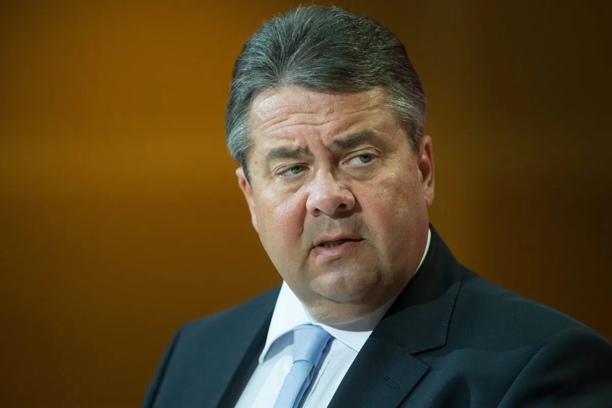 German Vice Chancellor Sigmar Gabriel speaks during a news conference after a meeting with representatives of the Yazidi community in Germany in Berlin, Germany Tuesday, Aug. 12, 2014. Gabriel has called for the international community to consider a plan to create safe zones for the Yazidi community in Iraq. He said such a move, rather than wholesale evacuation of the embattled minority, would avoid hastening the “ethnic cleansing” that Sunni extremists are trying to achieve in Iraq. (AP Photo/dpa, Maurizio Gambarini/dpa +++(c) dpa - Bildfunk+++