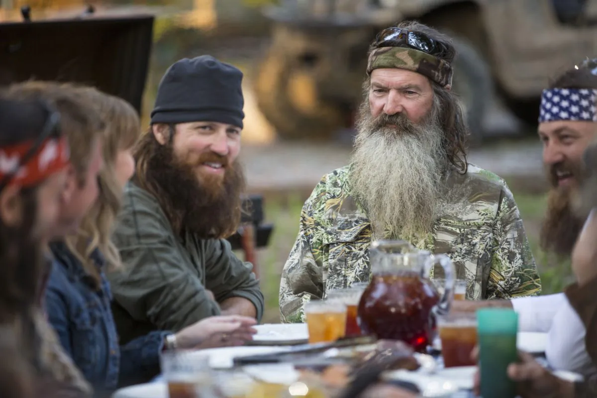 Phil Robertson, flanked by his sons Jase Robertson, left, and Willie Robertson from the popular series "Duck Dynasty." (AP Photo/A&E, Zach Dilgard)