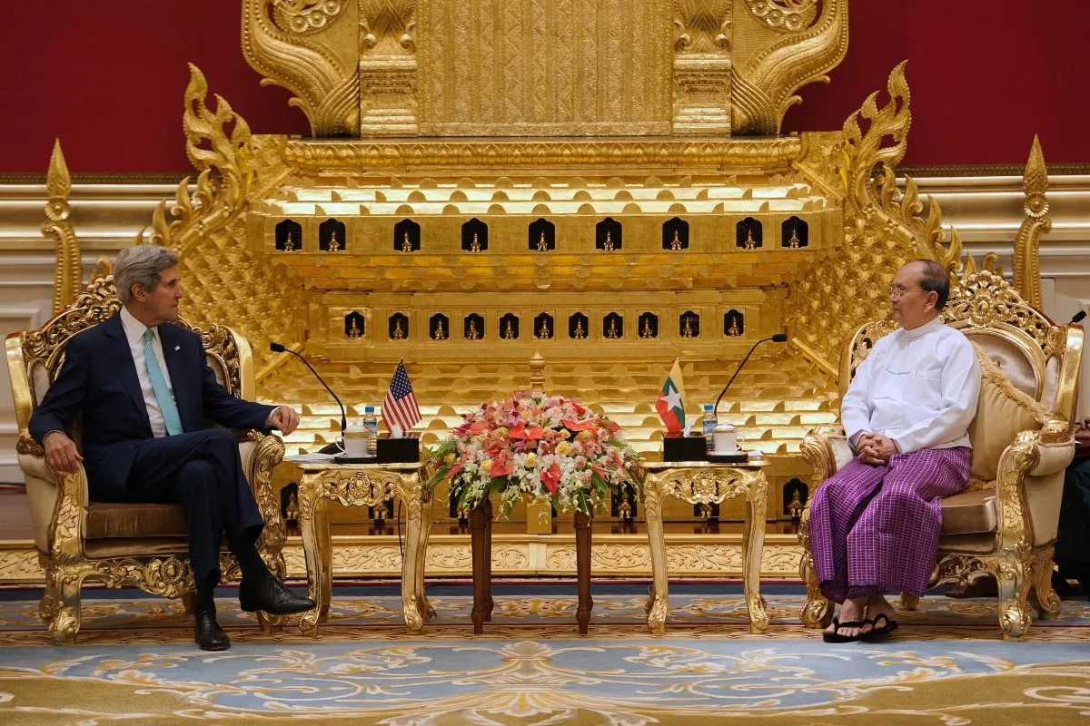 U.S. Secretary of State John Kerry (L) speaks with Burma President Thein Sein during their meeting at the Presidential hall outside the venue of the 47th ASEAN Foreign Ministers' Meeting in Naypyidaw, Burma, on Aug. 9, 2014. (Nicolas Asfouri/AFP/Getty Images)