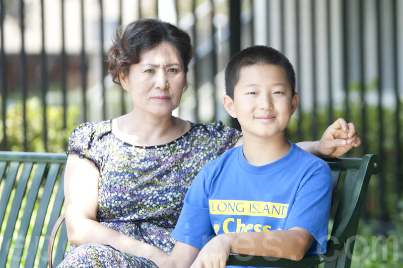 Geng He, wife of Chinese rights lawyer Gao Zhisheng, and their son, Tianyu, in the Bay Area, Calif., on Aug. 5. (Ma Youzhi/Epoch Times)