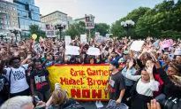 City Protests Join National Moment of Silence for Missouri Teen