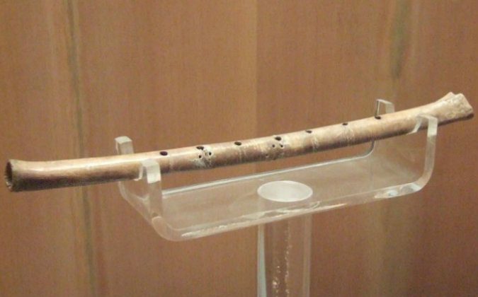 A neolithic bone flute discovered in Jiahu, Henan Province, China, believed to be 9000 years old. (asgitner via wikimedia commons)