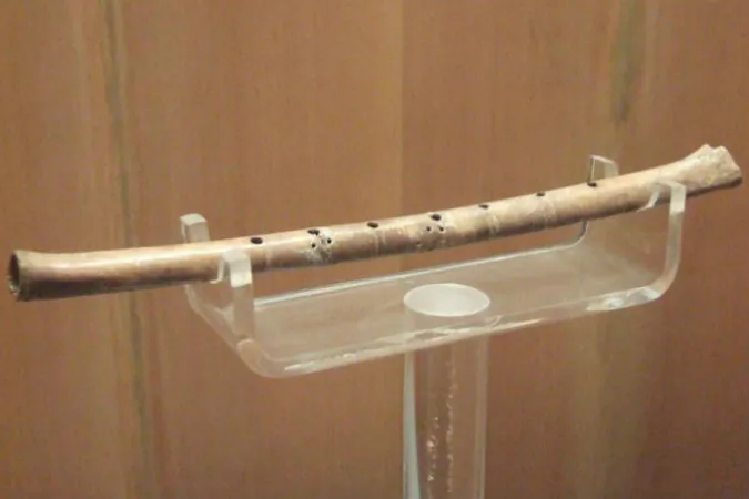 A neolithic bone flute discovered in Jiahu, Henan Province, China, believed to be 9000 years old. (asgitner via wikimedia commons)