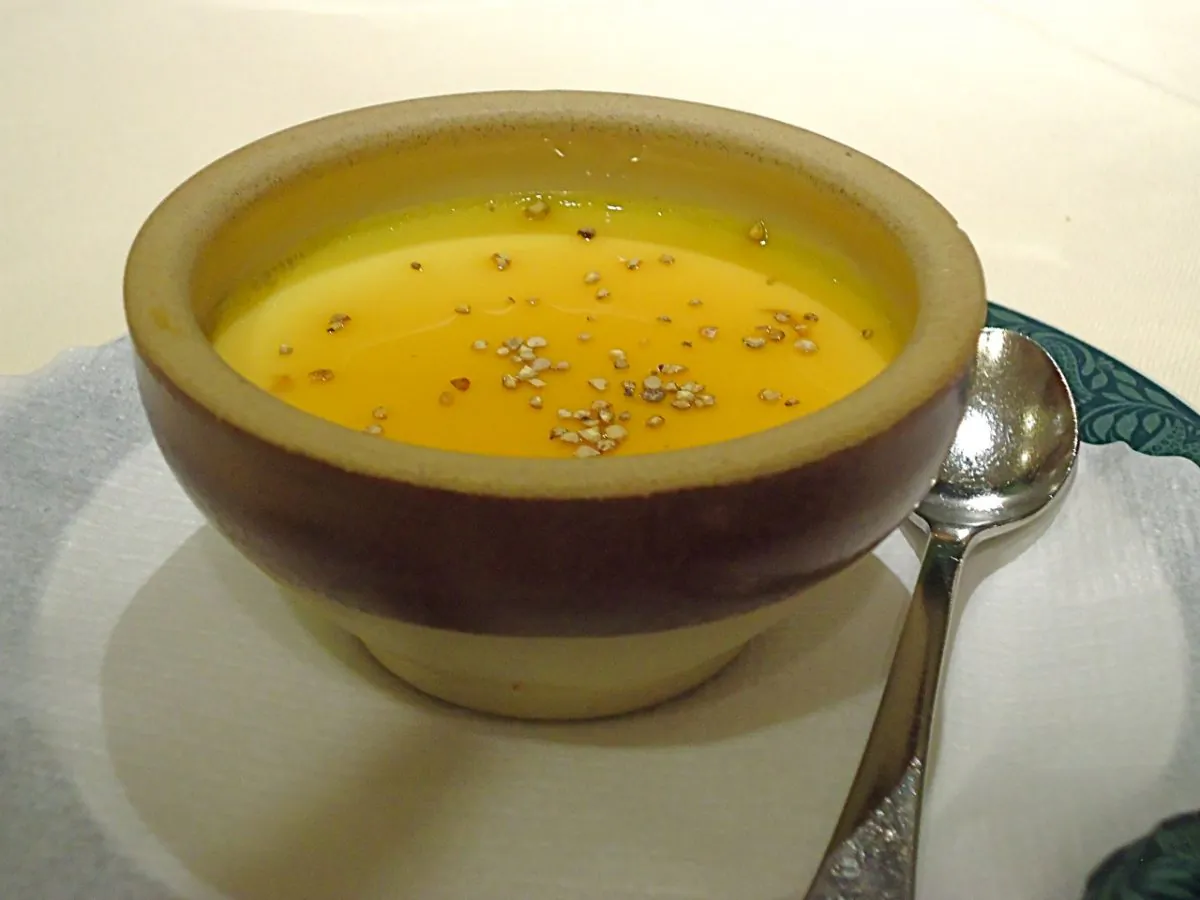Patina de piris, pears sautéed in wine, under a creamy custard. (Susan James)