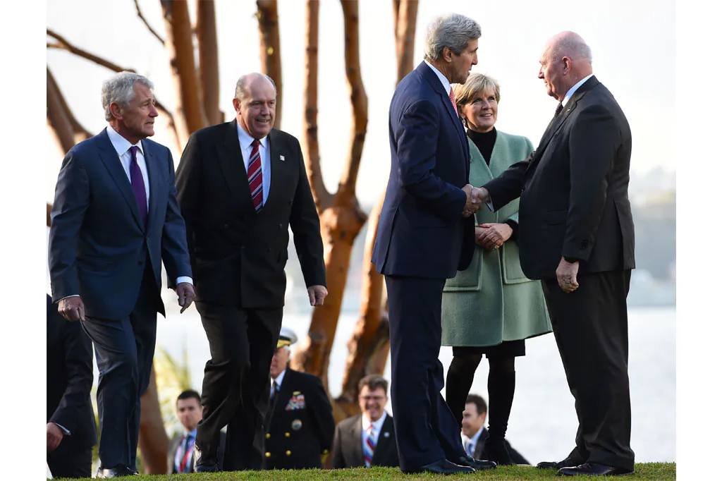 Secretary of State John Kerry (3rd-R), along with US Secretary of Defense Chuck Hagel (L), Australian Defense Minister David Johnston (2nd-L), and Australian Foreign Minister Julie Bishop (2nd-R) are greeted by Governor-General Sir Peter Cosgrove (R) at Admiralty House on Aug. 12, 2014 in Sydney, Australia. (Dan Himbrechts/Getty Images)