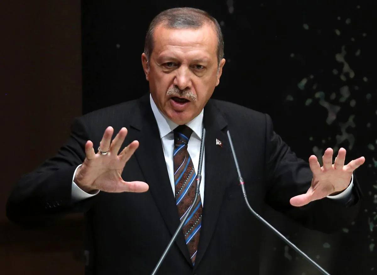 Turkey's Prime Minister Tayyip Erdogan addresses members of his ruling AK Party (AKP) during a meeting at the party headquarters in Ankara on August 14, 2014. (Adem Altan/AFP/Getty Images)