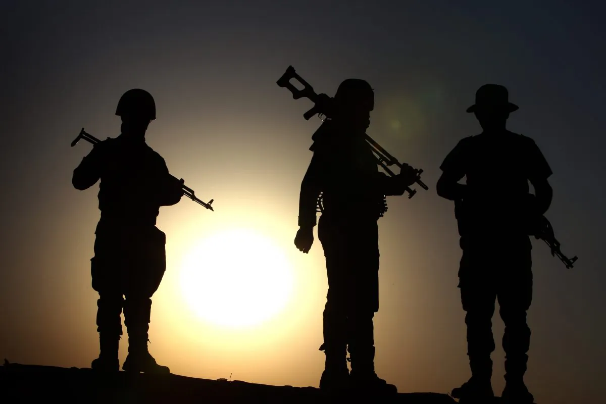 Iraqi Kurdish Peshmerga fighters take position on the front line in Khazer, near the Kurdish checkpoint of Aski kalak, 40 km West of Arbil, the capital of the autonomous Kurdish region of northern Iraq, on August 14, 2014. (Safin Hamed/AFP/Getty Images)