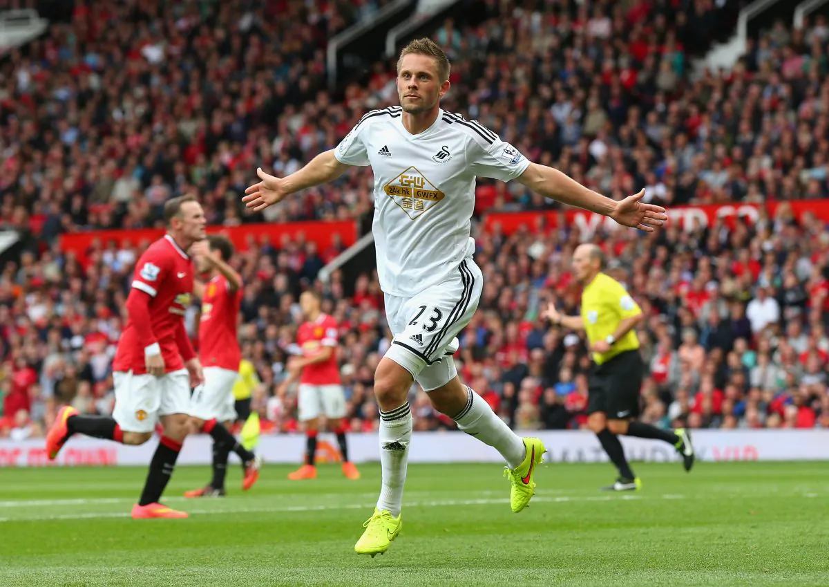 Gylfi Sigurdsson of Swansea City celebrates scoring the game-winning goal agaubst Manchester United at Old Trafford on August 16, 2014 in Manchester, England. (Alex Livesey/Getty Images)