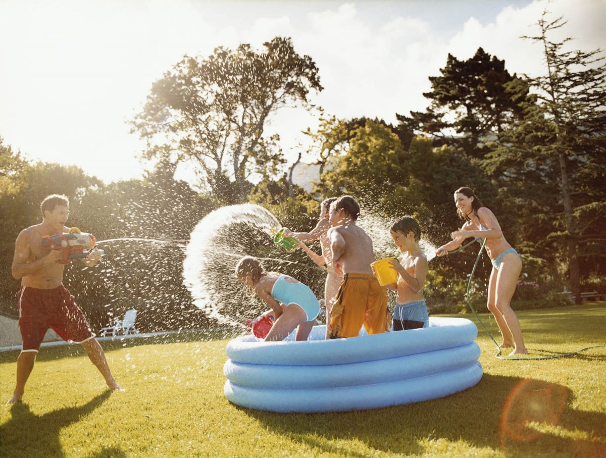 Backyard activities involving water provide summer fun for kids. (Digital Vision/Thinkstock)