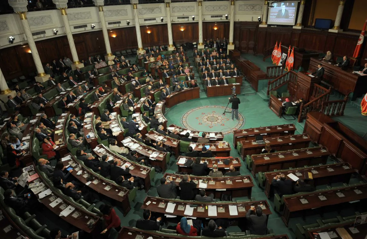 Tunisia's premier-designate Mehdi Jomaa (R) presents his new government during a parliamentary session in the constituent assembly in Tunis on Jan. 28, 2014. Tunisia's leaders the previous day signed the new constitution adopted by lawmakers, a key goal of the revolution three years ago that touched off the Arab Spring. (Fethi Belaid/AFP/Getty Images)
