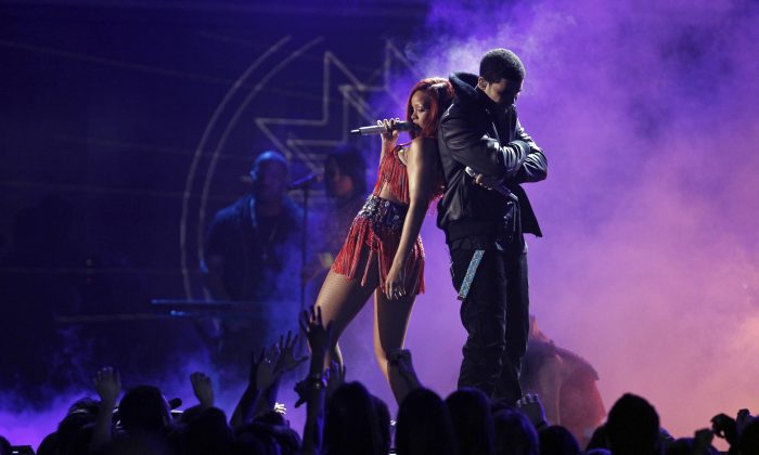 Rihanna, left, and Drake perform at the 53rd annual Grammy Awards on Sunday, Feb. 13, 2011, in Los Angeles. (AP Photo/Matt Sayles)