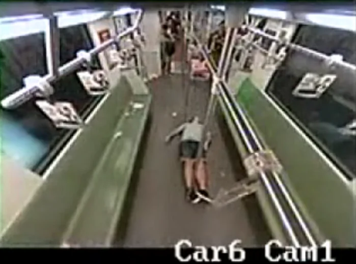 Surveillance video shows a passenger, a Westerner, lying on the floor on the Shanghai Metro in Shanghai, China, on Aug. 9. Passengers in the cart fled the scene after seeing him faint. (Screenshot/Sohu.com)
