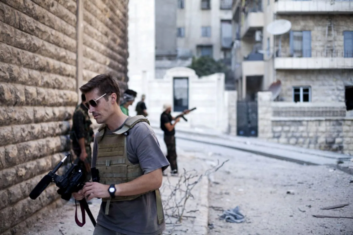 FILE - This September 2012 file photo posted on the website freejamesfoley.org shows journalist James Foley in Aleppo, Syria.In a horrifying act of revenge for U.S. airstrikes in northern Iraq, militants with the Islamic State extremist group have beheaded Foley — and are threatening to kill another hostage, U.S. officials say. (AP Photo/freejamesfoley.org, Manu Brabo, File) NO SALES